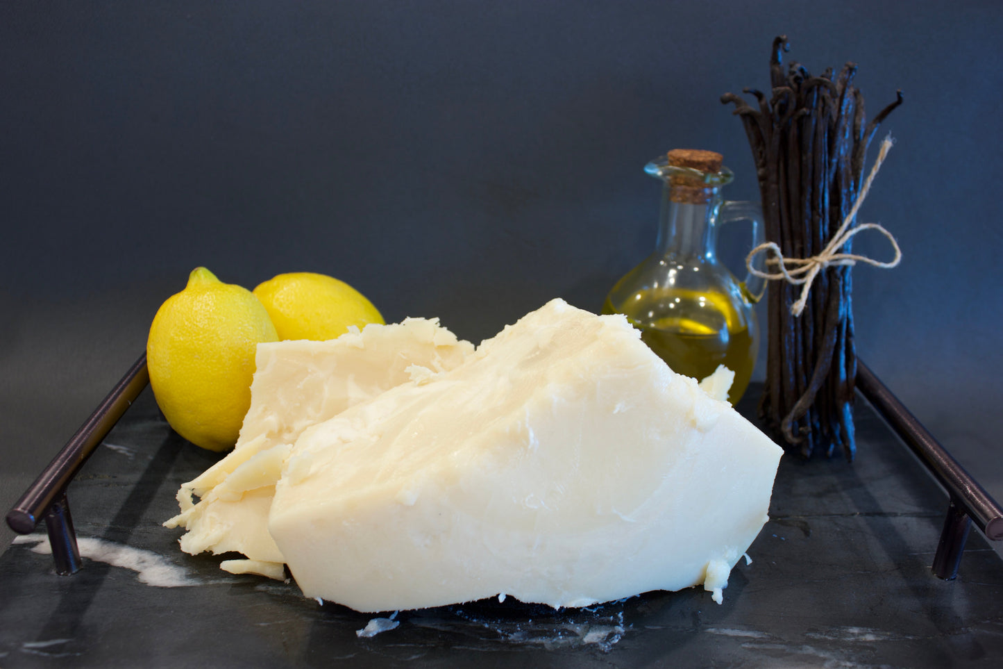 Texas Gold Tallow ingredients, raw tallow, raw vanilla beans, lemons and jojoba oil