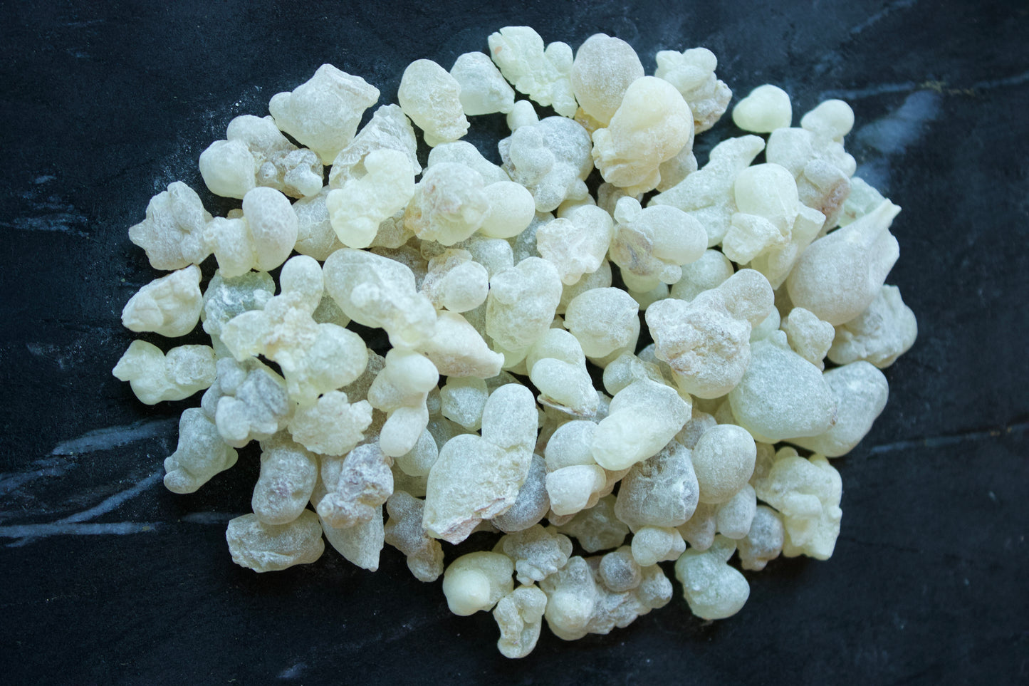 Royal Green Hojari Frankincense on a Black surface